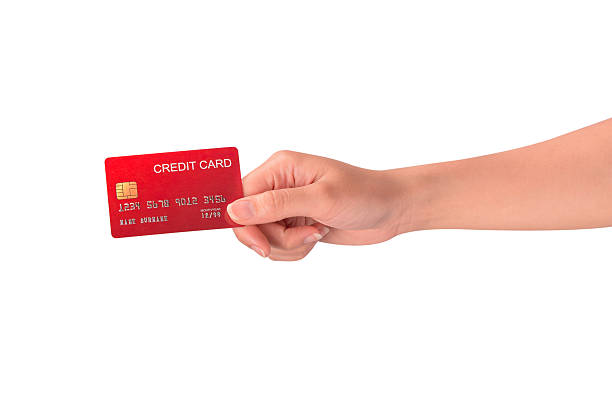istock Hand holding a credit card isolated on white background. High resolution, high quality studio shot. Concept for technology, business, finance, advertising, E-commerce, Shopping and lifestyle themes. 2254626113