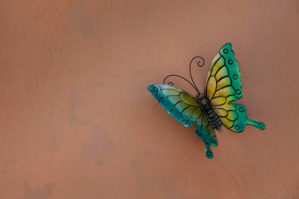 blue butterfly in watercolor against a white background\n​