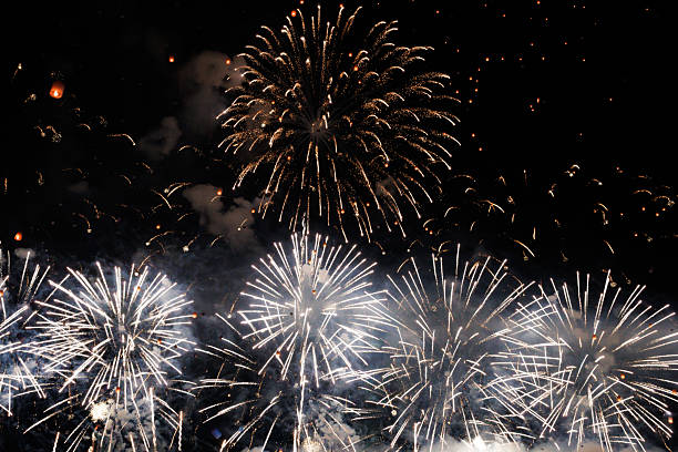 istock Colorful fireworks exploding above. Symbol of joy, success, and grand 2254627865