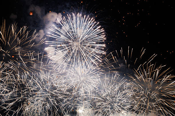 istock Colorful fireworks exploding above. Symbol of joy, success, and grand 2254627912
