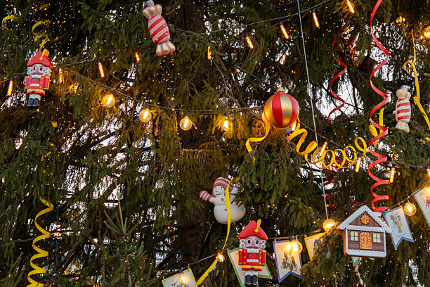 istock Christmas tree with lights and decorations, including Santa Claus ornament. 2254628147