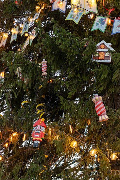 istock Christmas tree with lights and decorations, including Santa Claus ornament. 2254628271