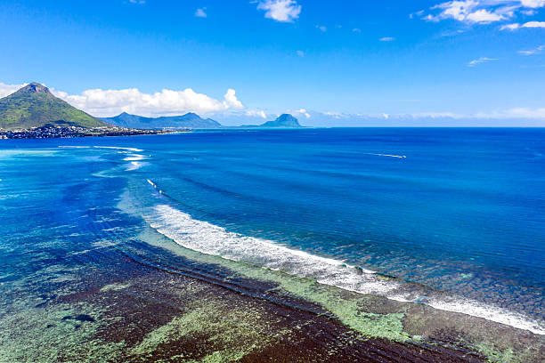 Aerial panoramic view of beautiful coral reef in front of tropical beach, Flick En Flack, Mauritius