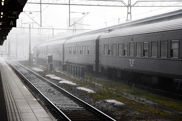 Gothenburg, Sweden, August 05.2025.A Swedish passenger train in Gothenburg at Centralstatation. Captured during a rainy day in summer season.