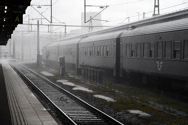 Gothenburg, Sweden, August 05.2025.A Swedish passenger train in Gothenburg at Centralstatation. Captured during a rainy day in summer season.