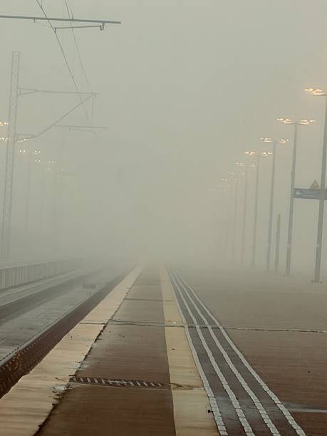 istock Train in the train station under the heavy dense foq 2254629716