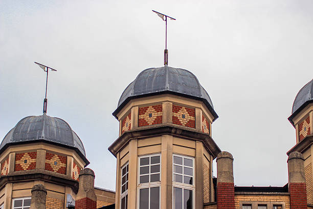 Oxford, United Kingdom - Dec 22, 2025: Beautiful Oxford architecture. An old brick building with domes on Worcester Street. Street photography of Oxford on a cloudy winter day.