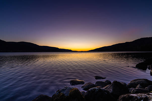 Loch Lomond sunset from the beach at Cashel, Scotland, UK.