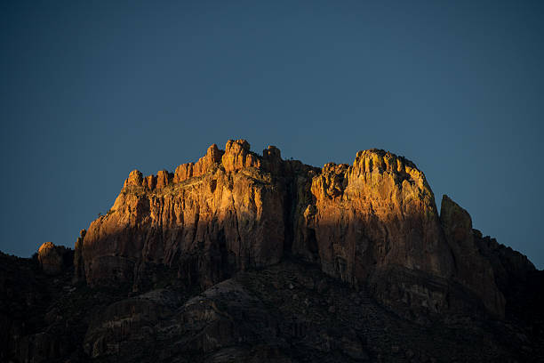 istock Shadows Climb Crown Mountain At Sunset In Big Bend 2254636120