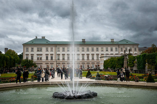 Salzburg's famous Mirabell Gardens with the Hohensalzburg fortress and old town in the background. High dynamic range photo. 