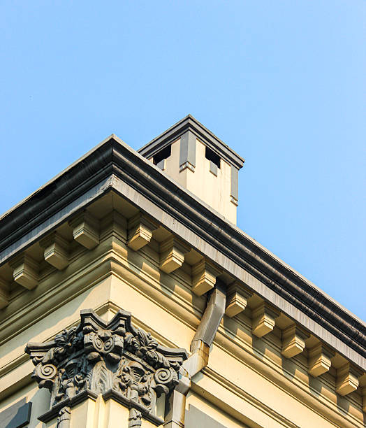 istock Low angle view of building architectural details against blue sky - Design concept 2254636573