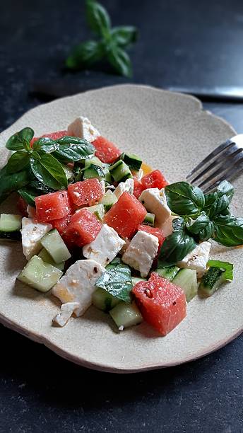 Watermelon and Feta Salad with Cucumber and Basil.