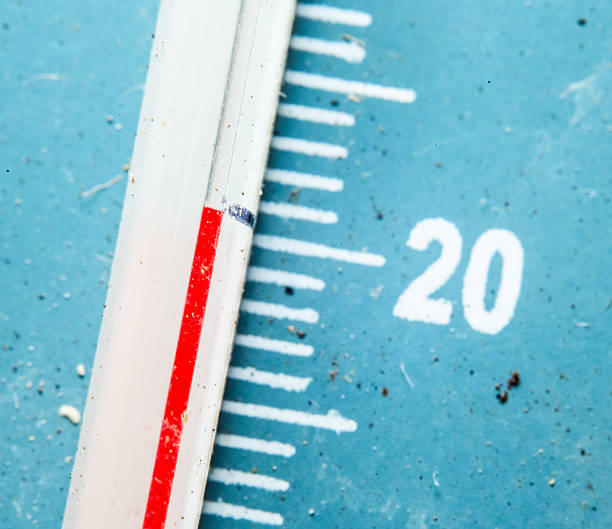 Outdoor thermometer showing twenty degrees temperature measurement