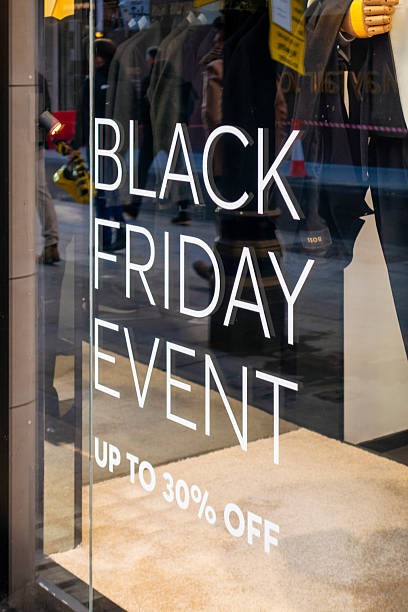 istock Black Friday Event - sign in store window 2254637833