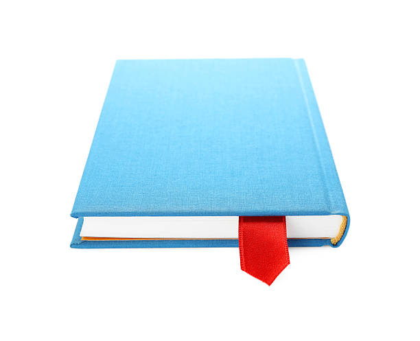 Book with red ribbon bookmark isolated on white