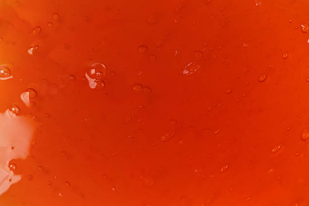 Red slime toy isolated background. Top view.
