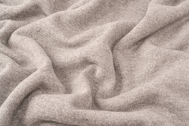 istock Soft grey merino wool sweater texture as a background. 2254642279