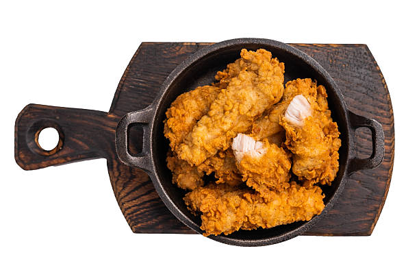 istock Fried chicken fillet tender strips isolated on white background 2254643072