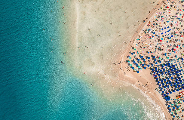 istock Drone view crowded Sardinia beach turquoise water 2254645572