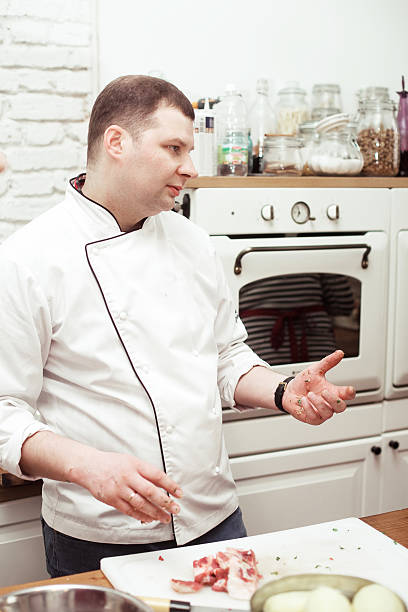 istock the chef shows a master class in the kitchen, shows the students a cooking lesson 2254650814