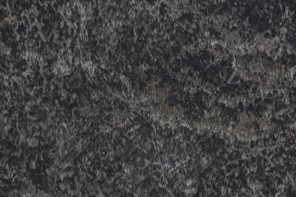 istock A close up of a black and grey stone surface 2254660784
