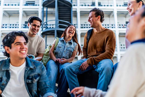 istock Young students friends talking and studying on university 2254663328