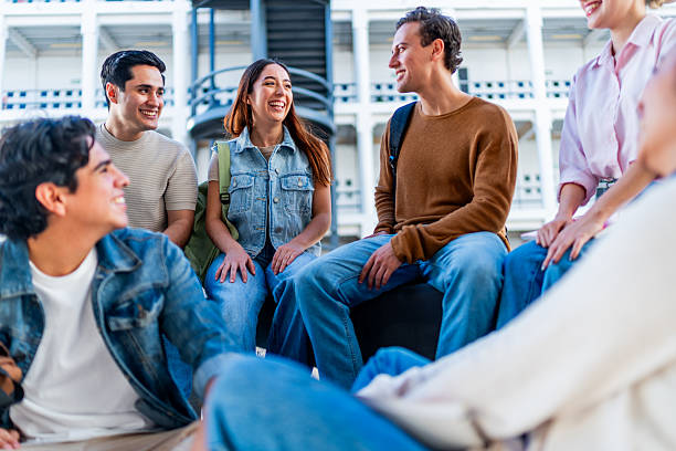 istock Young students friends talking and studying on university 2254663468