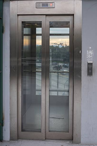 istock Modern glass elevator with stainless steel doors in Athens, Greece 2254663596