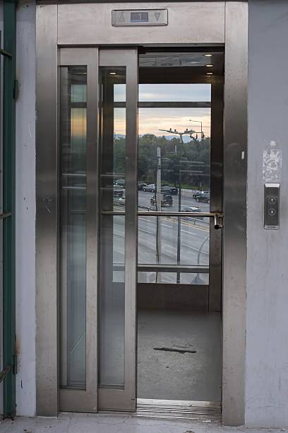 istock Modern glass elevator with stainless steel doors in Athens, Greece 2254663601