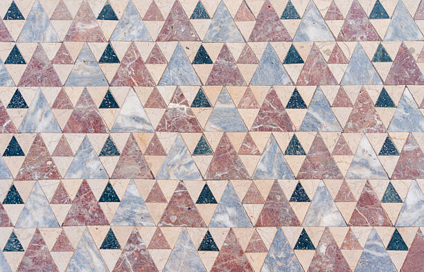 Mosaic made up of triangles of various sizes, materials and colors