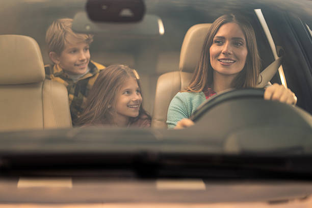 istock Family enjoying a road trip inside a vehicle 2254668730