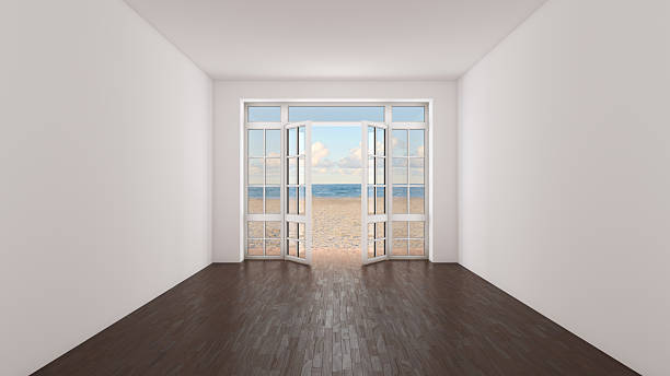 istock White Empty Room with Dark Parquet Flooring Overlooking the Sea 2254671474