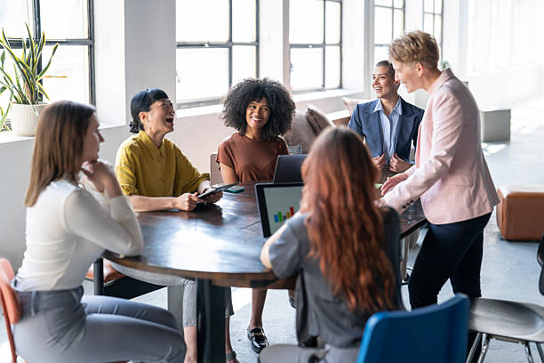 istock A female mentor is having a discussion with her team 2254671916