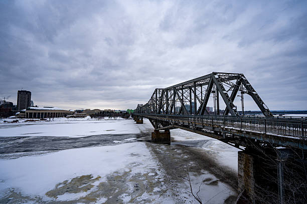 View of Alexandra Bridge over Ottawa River during winter. Ottawa, Canada - December 16, 2025.