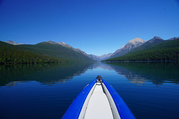 Different scenes in Glacier National PArk, inclduing boating on Bowman Lake, Views into Hidden Lake, Aerial shots, and a starscape