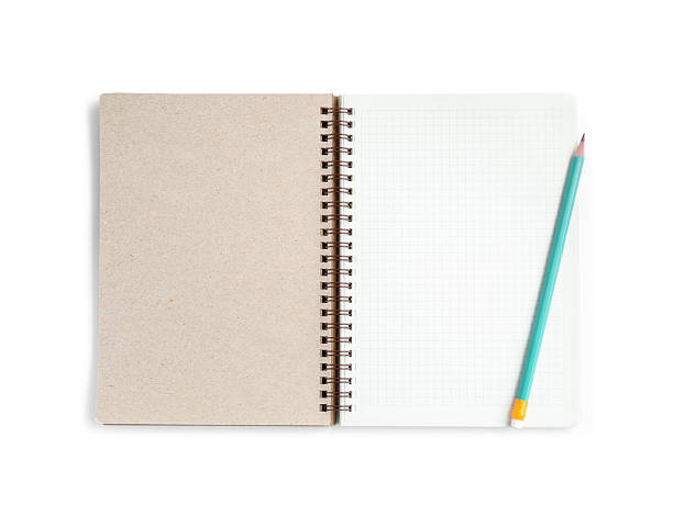 istock Notebook and pencil isolated on white, top view 2254699524