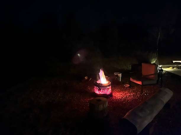 istock A campfire burns intensely inside a fire pit during the darkness of night 2254700431