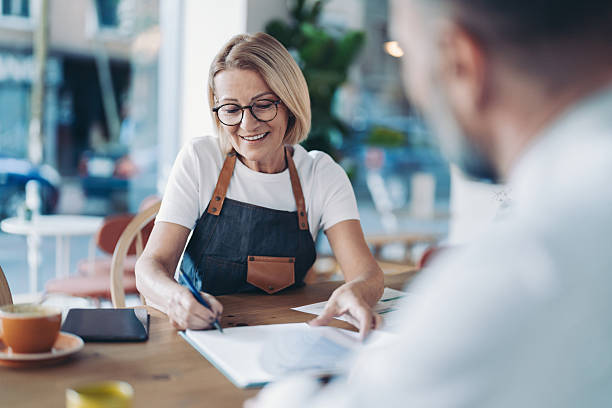 istock Small business owner signing a contract 2254711037