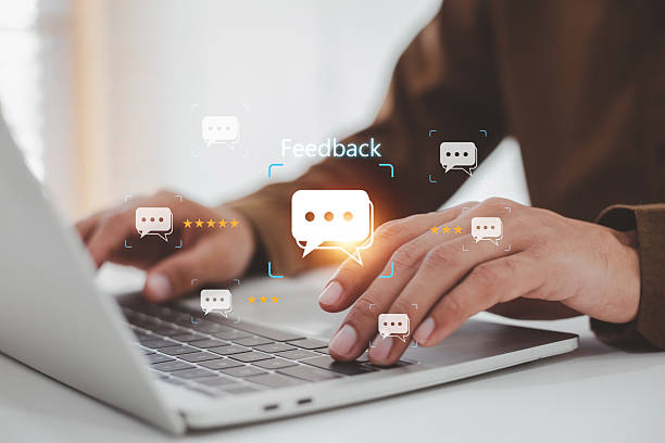 istock Customer Experience Feedback  Satisfaction Rating on Digital Service , uses a laptop, interacting with symbolizing customer service, satisfaction evaluation, and online review submission. 2254711704
