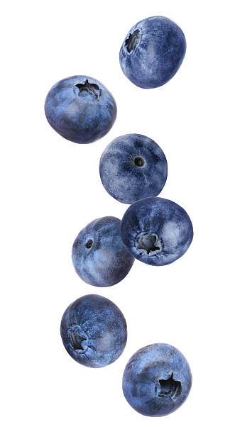 istock Fresh ripe blueberries in air on white background 2254711755