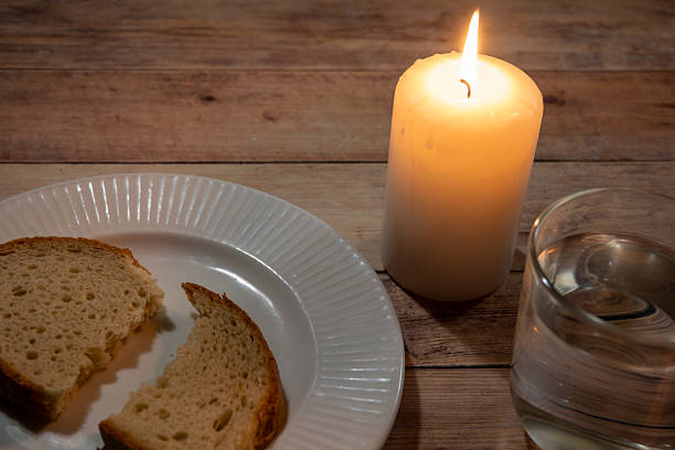 istock Christian Fasting Still Life With Candle And Bread 2254713606