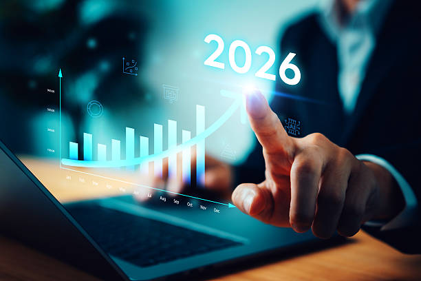 istock Digital strategy and future economic trend in 2026. Businessman touching virtual interface with rising financial chart and arrow, representing business growth, investment success, data analysis. 2254716769