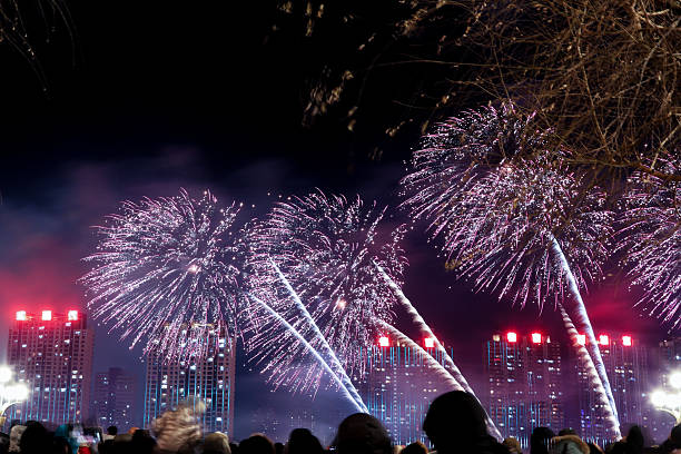 istock People watch the large fireworks display. 2254727621