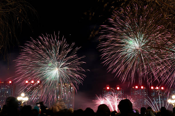 istock People watch the large fireworks display. 2254728454