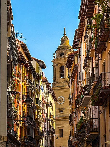istock Sunlit urban scene in Pamplona with mixed architecture 2254728599