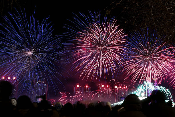istock People watch the large fireworks display. 2254728827