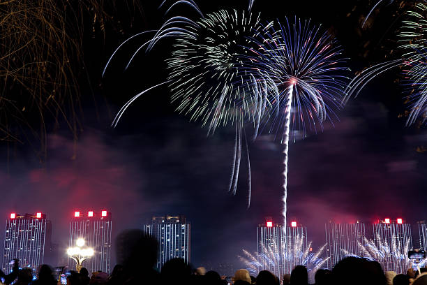 istock People watch the large fireworks display. 2254730026