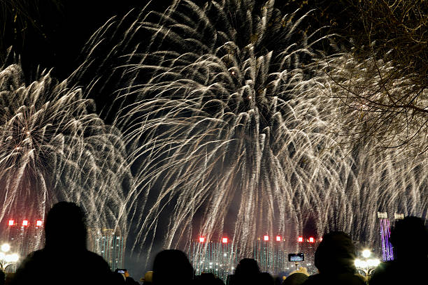 istock People watch the large fireworks display. 2254730174