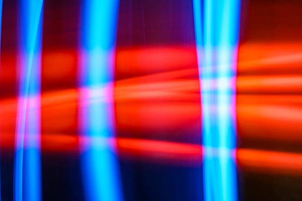 istock Abstract image features a blurred light painting technique, showcasing vibrant hues of red and blue in geometric shapes. The dynamic composition creates a sense of movement and energy 2254733144