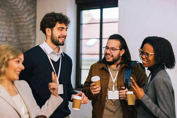 istock Business team standing with takeaway coffee 2254738213